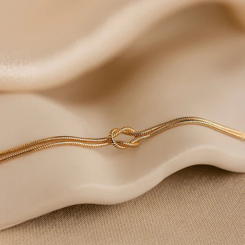 Armband "Ewiger Knoten" (KAUPFE 1 ERHALTE 1 GRATIS)